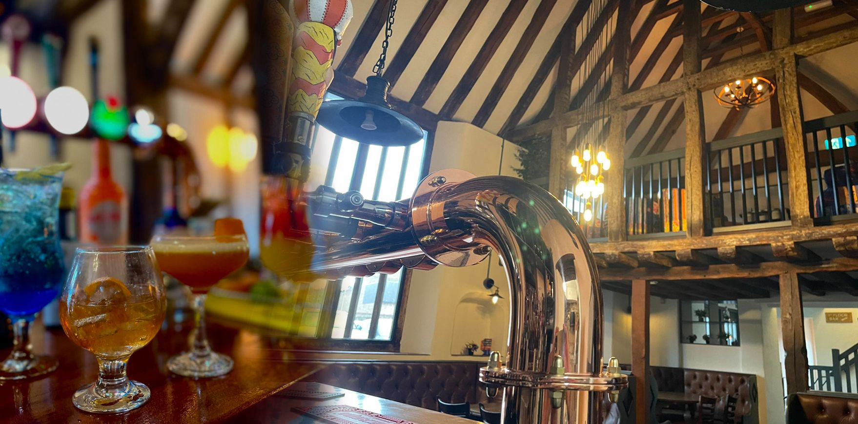 Relax and sip on cocktails and ales in our comfy snugs Relax and sip on cocktails and ales in our comfy snugs